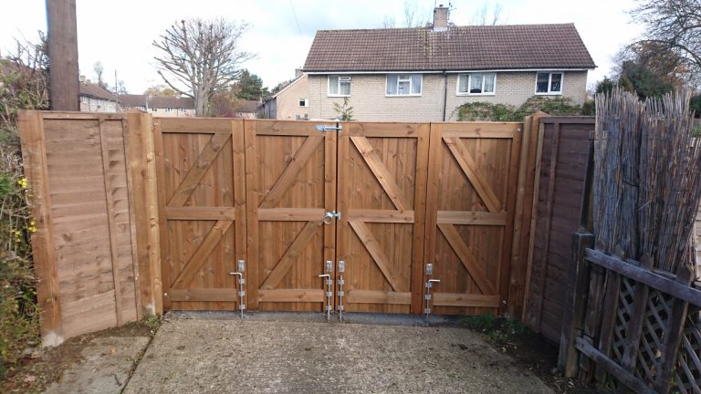 Bi-folding Gates in Welwyn Garden City Hertfordshire - Jarrett Fencing